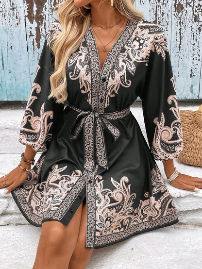 Printed V-neck three-quarter sleeve tie waist dress