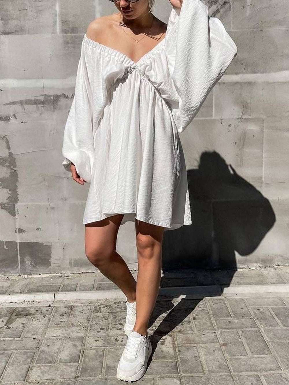 Mini skater dress made of fabric with deep neckline