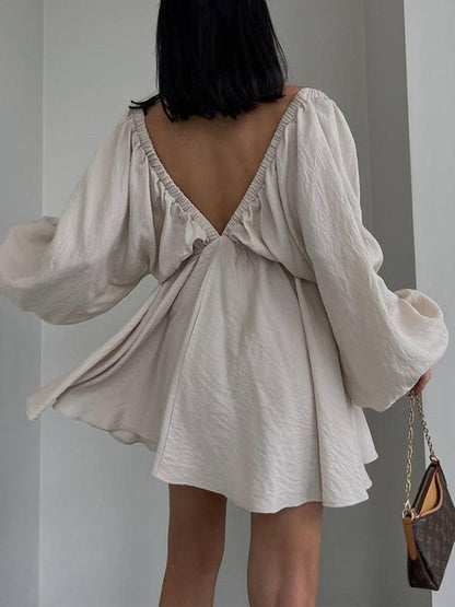 Mini skater dress made of fabric with deep neckline