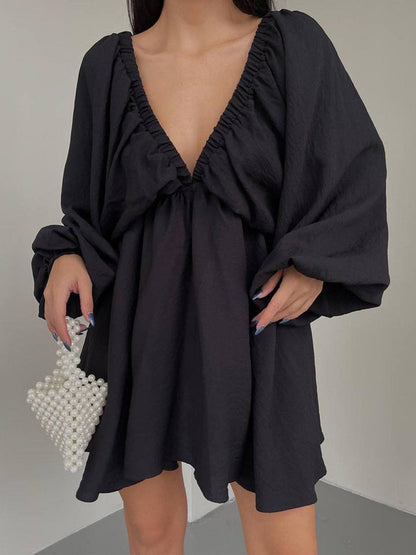 Mini skater dress made of fabric with deep neckline