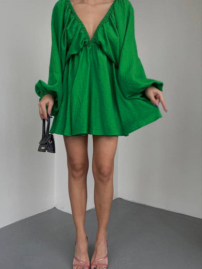 Mini skater dress made of fabric with deep neckline